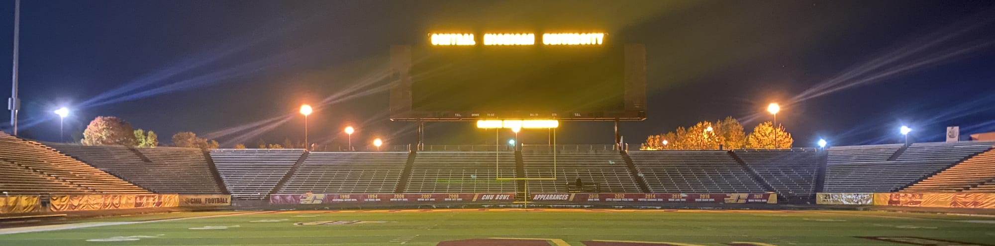 empty football stadium at night under the lights Columbia